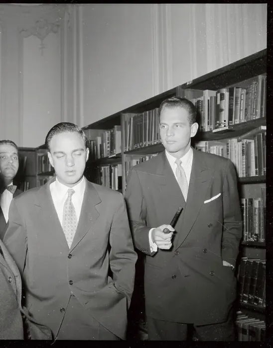 Framed Print : Gerard Shine and Roy Cohn with Others Near Bookshelf Framed Print : Gerard Shine and Roy Cohn with Others Near Bookshelf