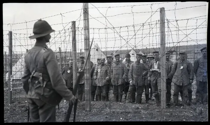 Framed Print : German Soldiers Behind Barbed Wire Framed Print : German Soldiers Behind Barbed Wire