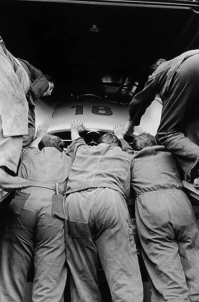German Team. 17th July 1954: The Mercedes team load one of their cars into