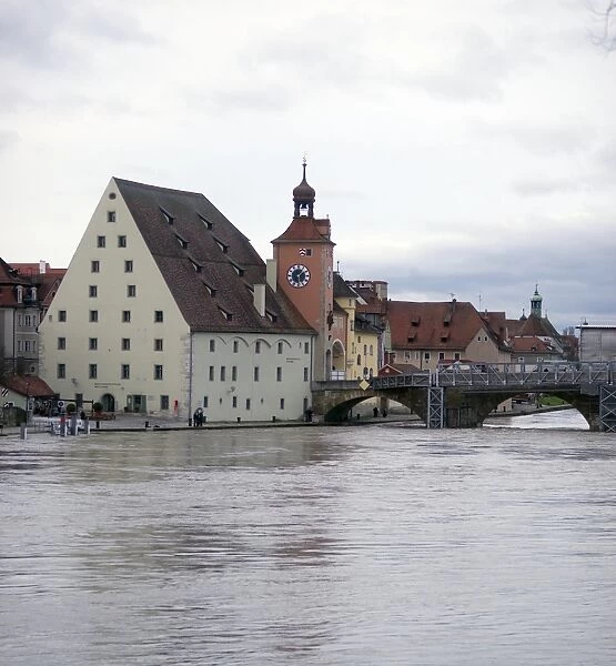 Germany, Bavaria, Regensburg, View Of River Danube, Historic Salt House, And Clock Tower