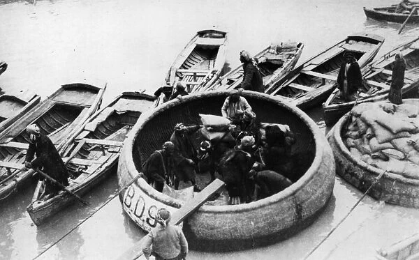 Ghoofas. circa 1918: Round boats, called ghoofas,