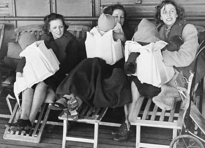Framed Print : GI Brides. Three British GI brides with their babies in lifejackets crossing Framed Print : GI Brides. Three British GI brides with their babies in lifejackets crossing