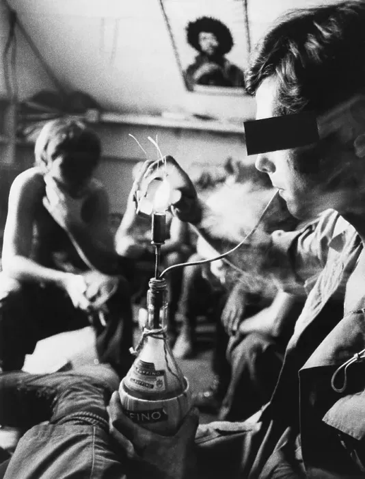 Framed Print : GI Lights Up A Hooka Made From A Bottle Framed Print : GI Lights Up A Hooka Made From A Bottle