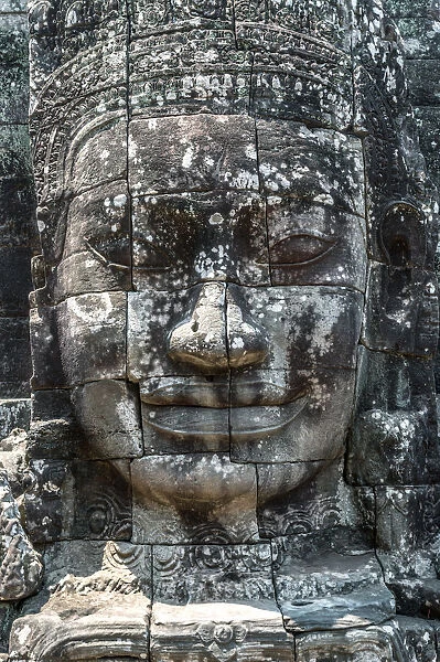 Giant Buddha stone faces inside Bayon temple, Angkor, Cambodia