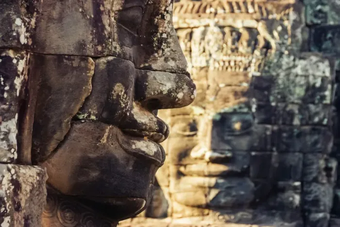 Framed Print : Giant carved stone faces at Bayon temple