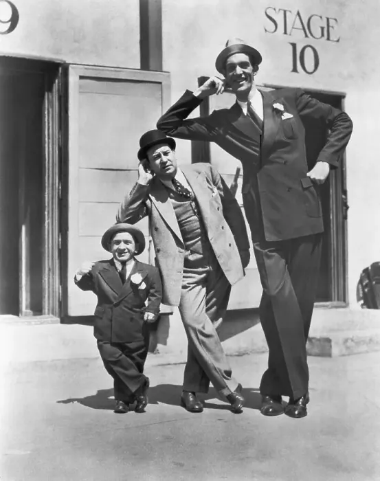 Framed Print : Giant, Dwarf, and Average Man Framed Print : Giant, Dwarf, and Average Man