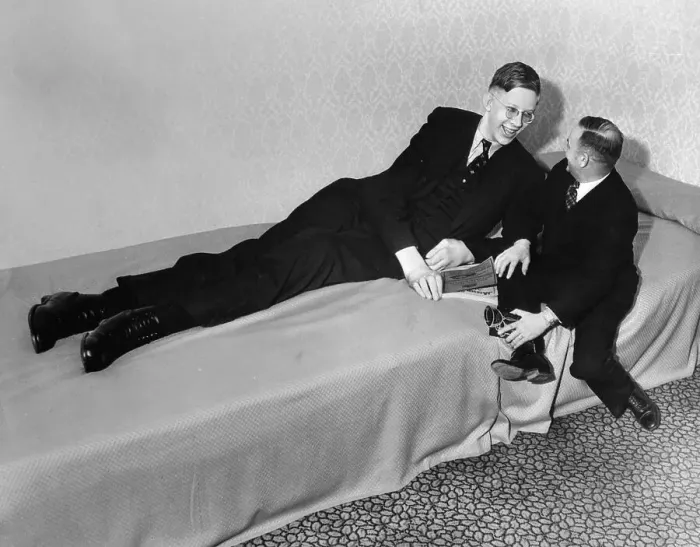 Framed Print : Giant Robert Wadlow Talking with a Friend on a Bed Framed Print : Giant Robert Wadlow Talking with a Friend on a Bed