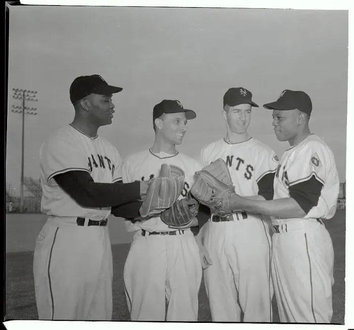 Framed Print : Giant Teammates Standing with Gloves Framed Print : Giant Teammates Standing with Gloves