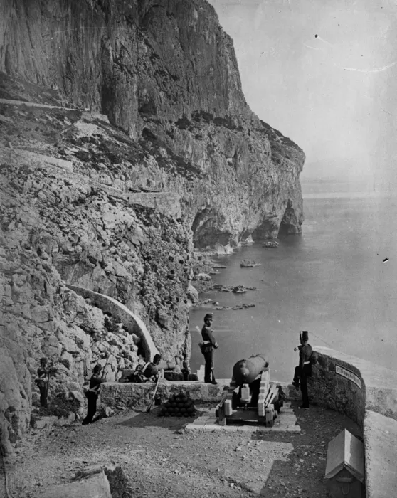 Framed Print : Gibraltar. 1862: Soldiers stand guard by a cannon overlooking the sea on Framed Print : Gibraltar. 1862: Soldiers stand guard by a cannon overlooking the sea on