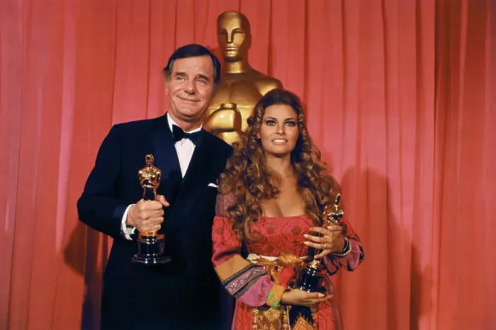 Framed Print : Gig Young and Raquel Welch Holding Awards Framed Print : Gig Young and Raquel Welch Holding Awards