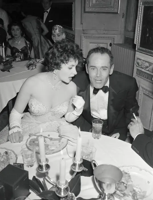 Framed Print : Gina Lollobrigida and Henry Fonda at Table Framed Print : Gina Lollobrigida and Henry Fonda at Table