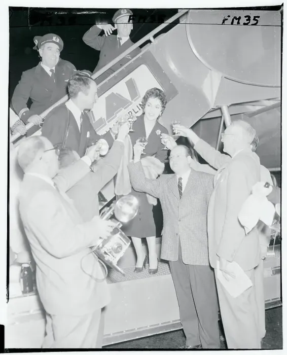 Framed Print : Gina Lollobrigida and Newsmen Drinking a Toast