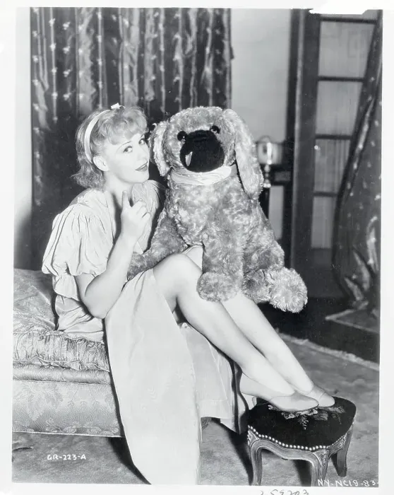Framed Print : Ginger Rogers Holding a Stuffed Animal Framed Print : Ginger Rogers Holding a Stuffed Animal