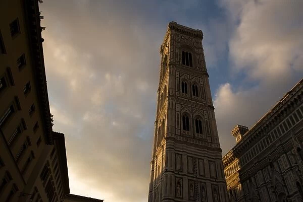 Giottos bell tower at Duomo Santa Maria Del Fiore during sunset