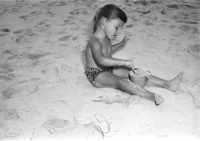 Framed Print : Girl (4-5) playing in sand Framed Print : Girl (4-5) playing in sand