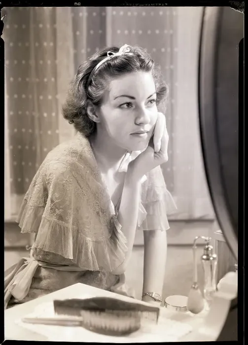 Framed Print : Girl Applying Facial Powder Framed Print : Girl Applying Facial Powder