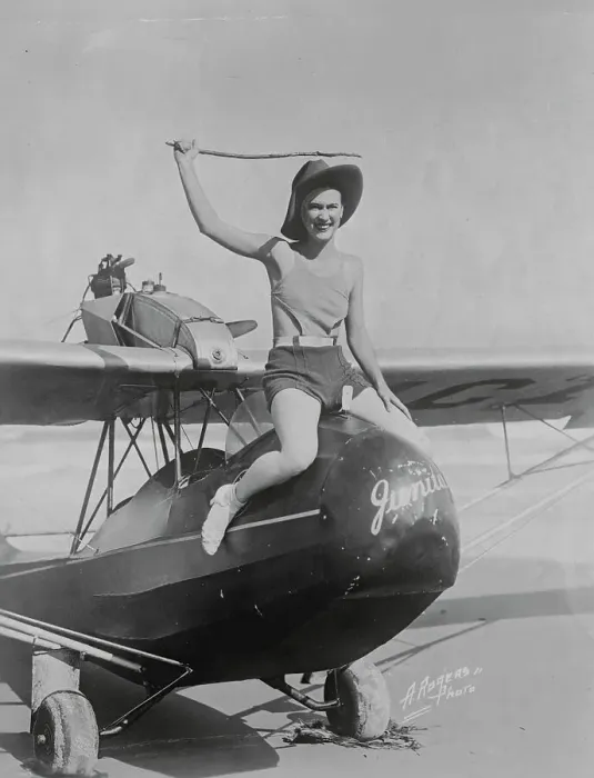 Framed Print : Girl Atop a Plane Framed Print : Girl Atop a Plane