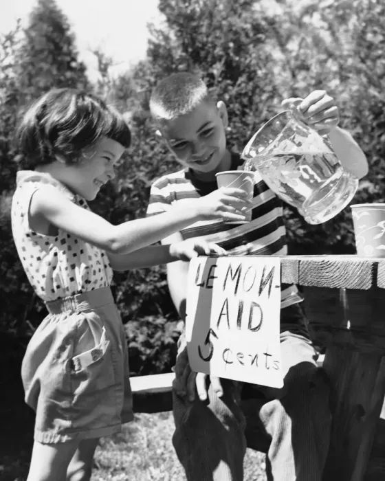 Framed Print : Girl and boy at lemonade stand Framed Print : Girl and boy at lemonade stand
