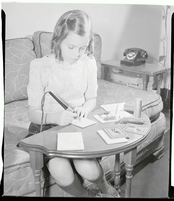 Framed Print : Girl Drawing with Electric Pen Framed Print : Girl Drawing with Electric Pen