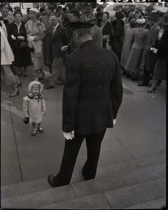 Framed Print : Girl In Dress Looking Up At Policeman Framed Print : Girl In Dress Looking Up At Policeman