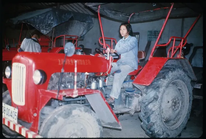 Framed Print : Girl Driving Tractor Framed Print : Girl Driving Tractor