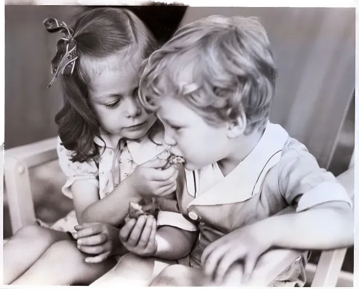 Framed Print : Girl Feeding Boy Framed Print : Girl Feeding Boy