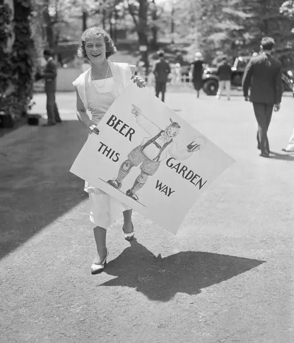 Framed Print : Girl Holding Beer Garden Sign Framed Print : Girl Holding Beer Garden Sign