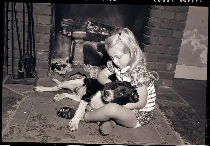 Framed Print : Girl Holding Dog