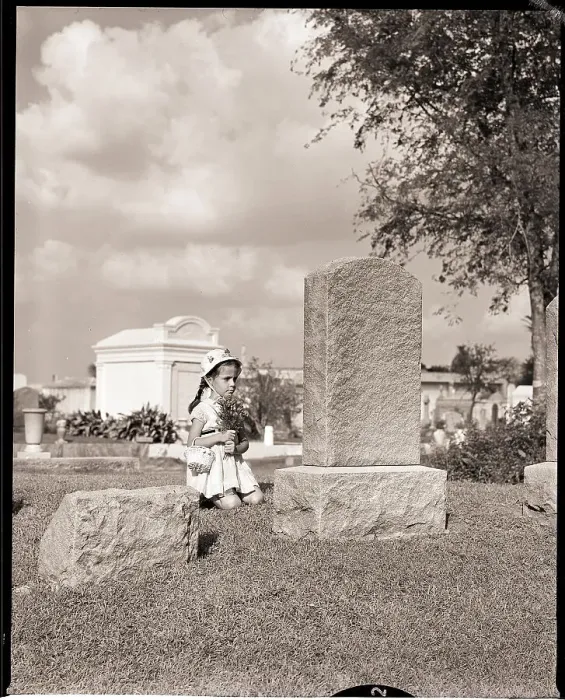 Framed Print : Girl Kneels at Headstone Framed Print : Girl Kneels at Headstone