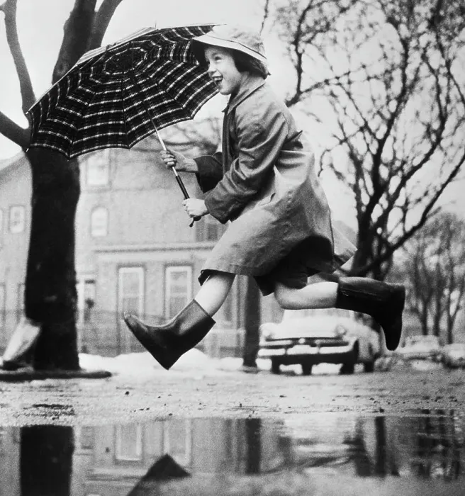 Framed Print : Girl Leaping over Mud Puddle Framed Print : Girl Leaping over Mud Puddle