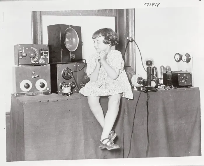 Framed Print : Girl Listening to a Radio Framed Print : Girl Listening to a Radio