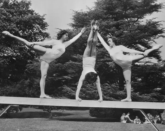 Framed Print : Three US Girl Olympic Gymnasts Posing on Fence Rail