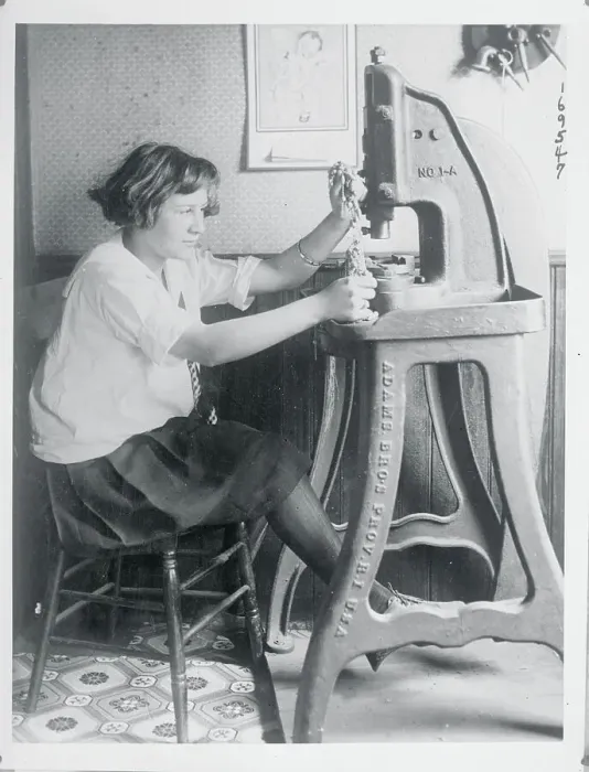 Framed Print : Girl Operating Jewelry Stamping Machine by Foot Power Framed Print : Girl Operating Jewelry Stamping Machine by Foot Power