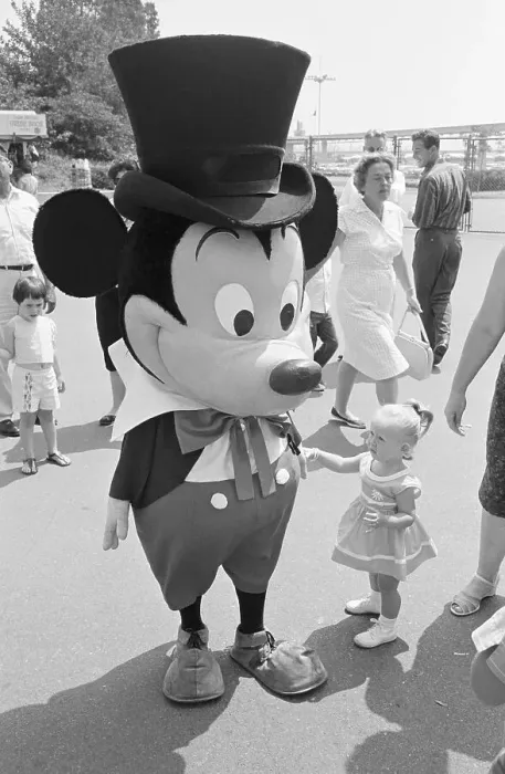 Framed Print : Girl Pausing with Mickey at Disneyland Framed Print : Girl Pausing with Mickey at Disneyland
