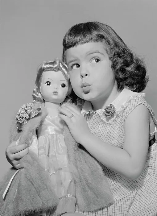 Framed Print : Girl Playing with Doll Wearing Real Mink Coat Framed Print : Girl Playing with Doll Wearing Real Mink Coat
