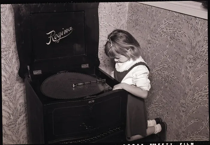 Framed Print : Girl Playing with Large Music Box Framed Print : Girl Playing with Large Music Box