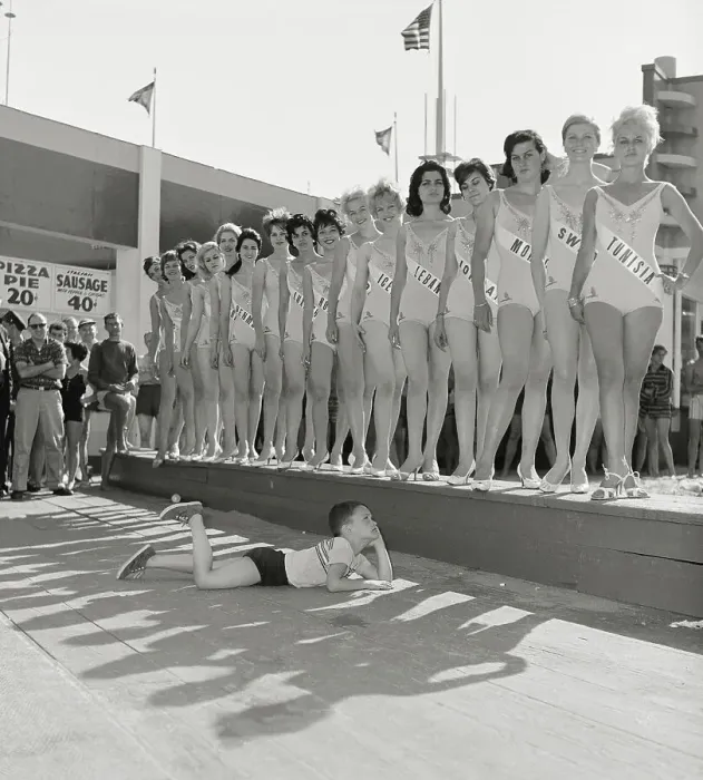 Framed Print : Girl Posing near Beauty Contestants Framed Print : Girl Posing near Beauty Contestants