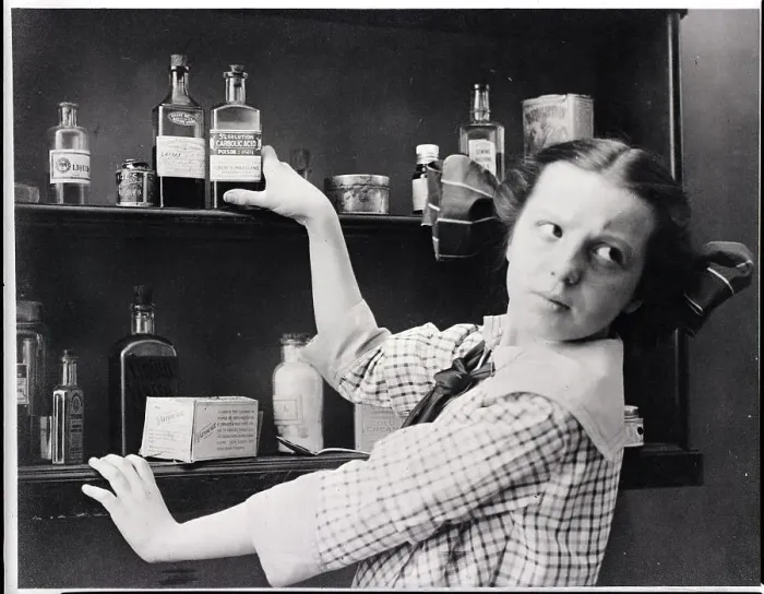 Framed Print : Girl Reaches For Medicine Shelve Framed Print : Girl Reaches For Medicine Shelve