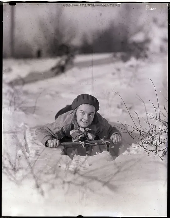 Framed Print : Girl Riding A Sled In The Snow Framed Print : Girl Riding A Sled In The Snow
