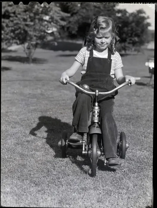 Framed Print : Girl Riding a Tricycle