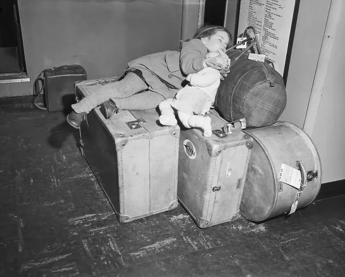 Framed Print : Girl Sleeping on Luggage at Airport Framed Print : Girl Sleeping on Luggage at Airport