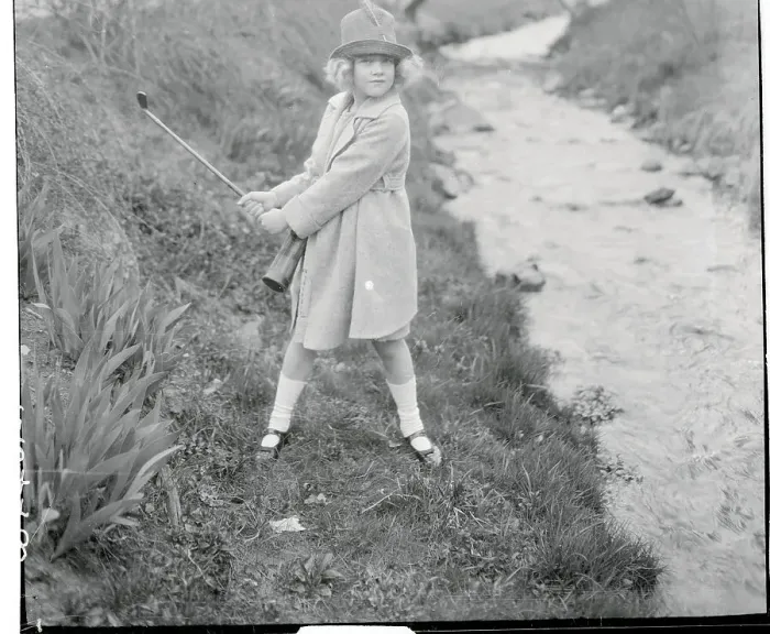 Framed Print : Girl Swinging a Golf Club Framed Print : Girl Swinging a Golf Club