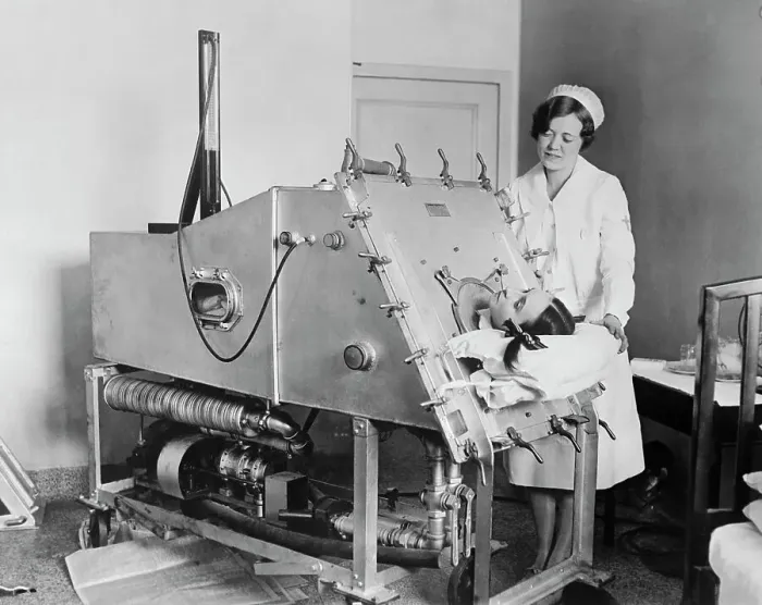 Framed Print : Girl Being Taken Care of in Respirator Framed Print : Girl Being Taken Care of in Respirator