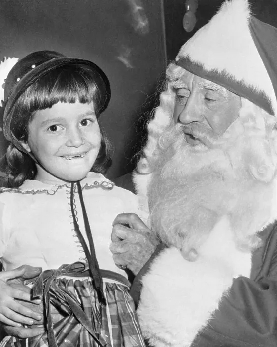 Framed Print : Girl Talking to Santa Claus Framed Print : Girl Talking to Santa Claus