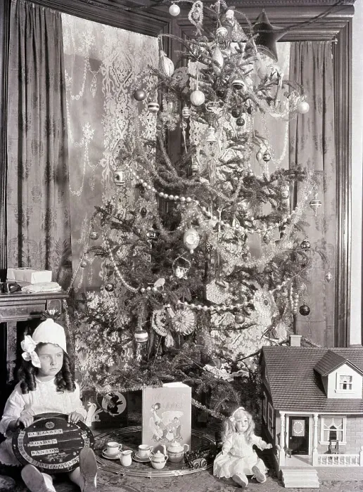 Framed Print : Girl with Toys at Christmas Tree