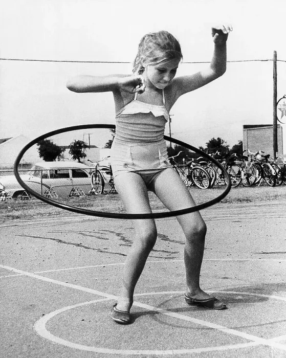 Framed Print : Girl Twirling Hula Hoop Framed Print : Girl Twirling Hula Hoop