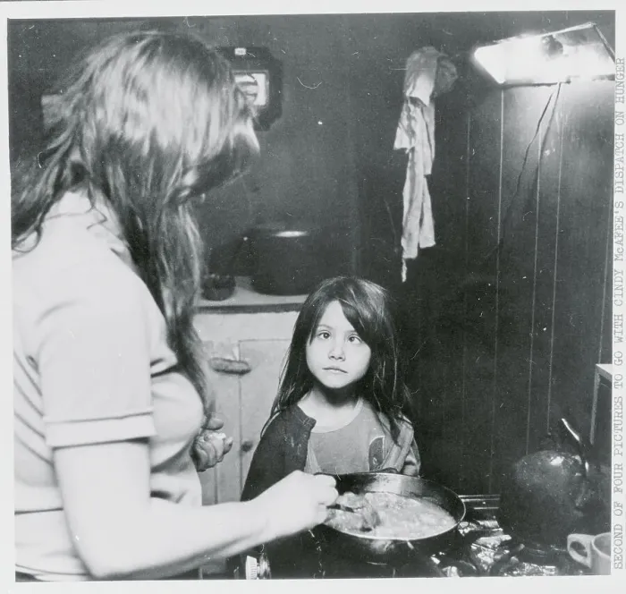 Framed Print : Girl Watching Her Mother Prepare a Meal Framed Print : Girl Watching Her Mother Prepare a Meal