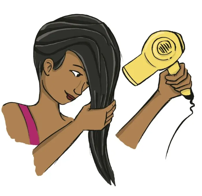 Framed Print : Girl wringing her long dark hair while holding blow dryer in the other hand Framed Print : Girl wringing her long dark hair while holding blow dryer in the other hand
