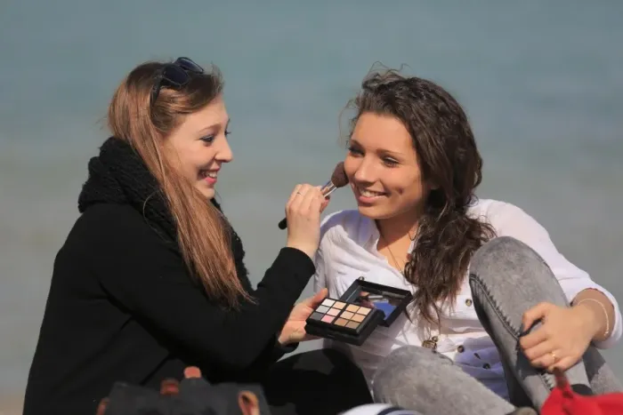 Framed Print : Two girlfriends, teenagers, sitting on the beach, applying makeup on each other, Menton, Alpes-Maritimes, Provence Alpes, France Framed Print : Two girlfriends, teenagers, sitting on the beach, applying makeup on each other, Menton, Alpes-Maritimes, Provence Alpes, France