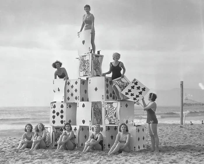 Framed Print : Girls Building Giant House of Cards Framed Print : Girls Building Giant House of Cards